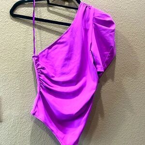 One shoulder magenta colored body suit